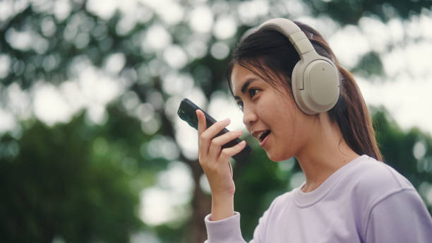istock Young woman use ai voice assistant while travel. 2196072918