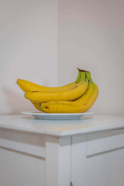 istock Fresh ripe banana fruit on corner table in hall 2196074437
