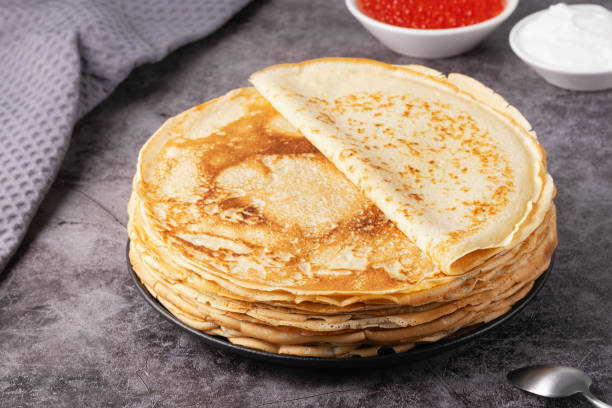 istock Freshly baked pancakes with red caviar 2196075404