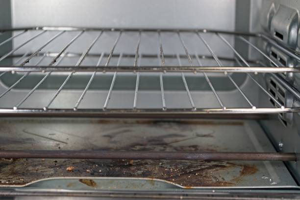 istock Dirty tray in a toaster oven 2196076441