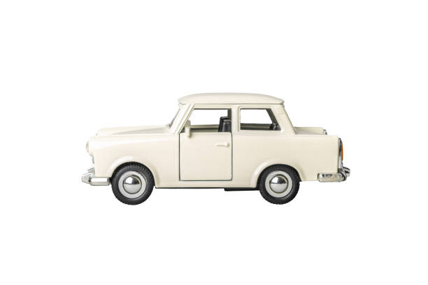 istock A white toy car trabant with chrome trim sits on a white background 2196076848