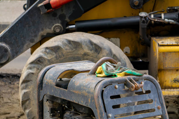 istock construction equipment on a road construction site in the city. compactor, soil compactor, work gloves, yellow excavator. road and earthworks. 2196077399
