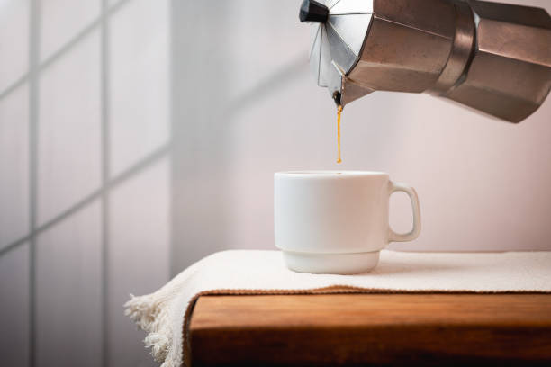 istock Cup of coffee on a minimalist background 2196078858