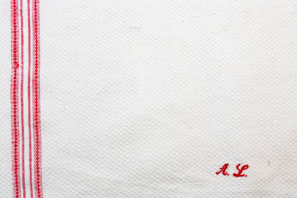 istock old kitchen towel with initial A.S stitch in red 2196078961