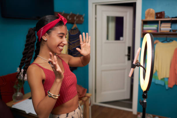 istock Biracial Girl Dancing While Livestreaming 2196081526