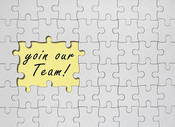 istock Recruitment process, searching for best applicant. Fitting missing jigsaw puzzle piece, top view 2196081833