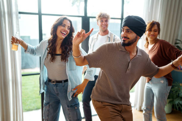 istock Friends having fun and dancing during party at home 2196081841