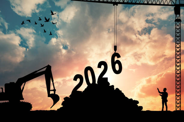 istock Silhouette construction site, Cranes building construction prepare to welcome the new year 2026 at sunset. 2196081879