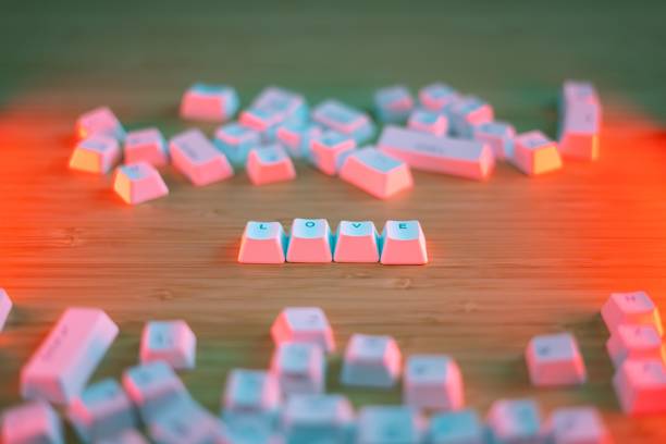 istock Keyboard keys spelling 'LOVE' with colorful lighting. 2196089854