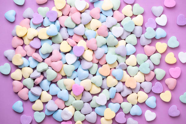 istock Pastel candy conversation hearts Valentine's Day background 2196092390