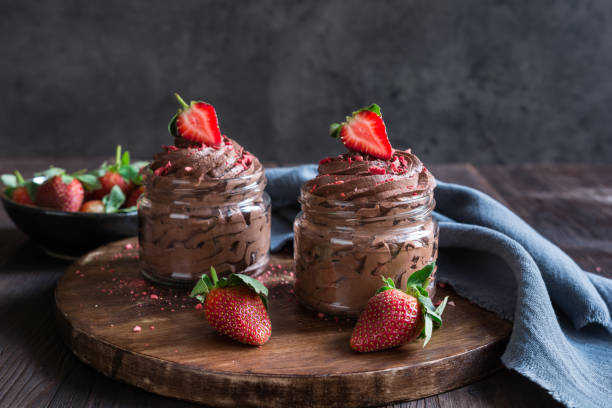 istock Chocolate mousse topped with fresh and freeze-dried strawberries 2196099449