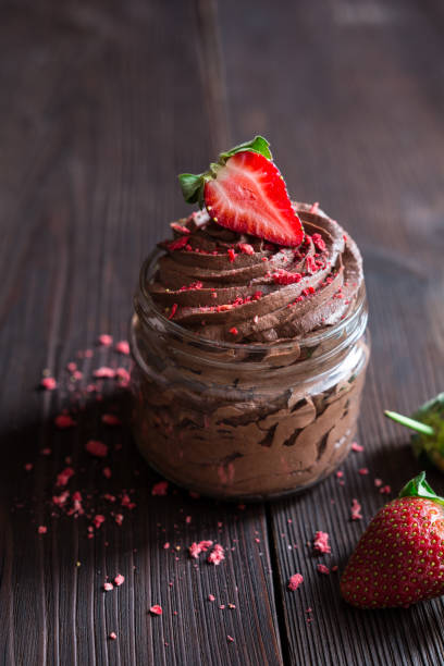 istock Chocolate mousse topped with fresh and freeze-dried strawberries 2196099457