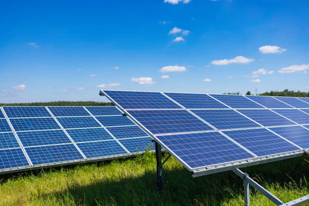 istock modern solar panels in a rural landscape 2196103068