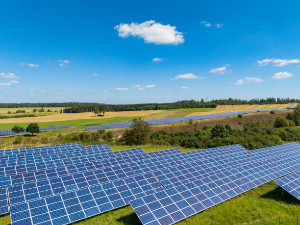 istock modern solar panels in a rural landscape 2196103148