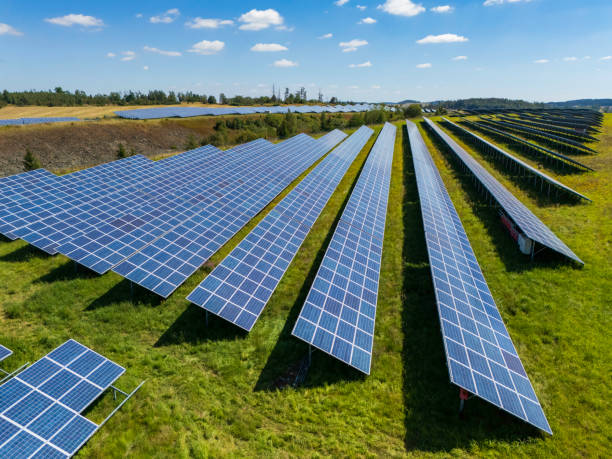 istock modern solar panels in a rural landscape 2196103165