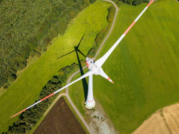 istock power generating wind turbines in the countryside (aerial) 2196103343