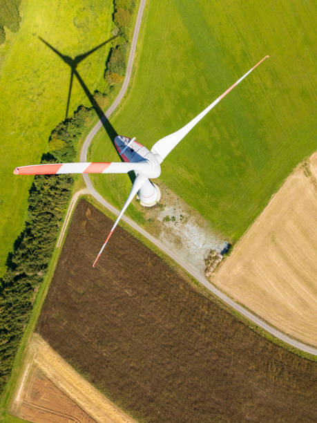 istock power generating wind turbines in the countryside (aerial) 2196103363