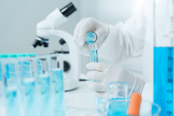 istock Scientist analyze biochemical sample in advanced scientific laboratory. Medical professional check chemical mix microbiological developmental of viral. Biotechnology research in science lab. cosmetic 2196104668
