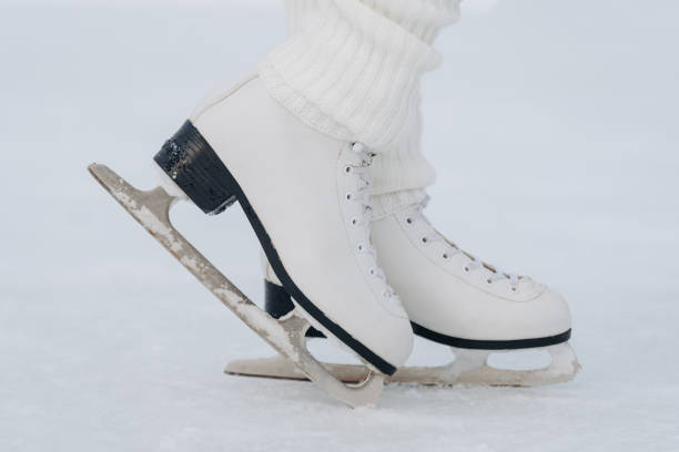 istock young redhead girl in ice rink 2196105436