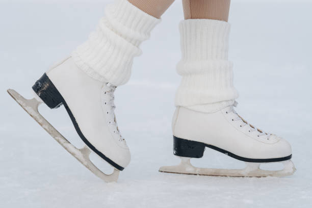 istock young redhead girl in ice rink 2196105448