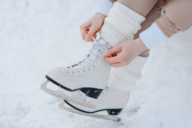 istock young redhead girl in ice rink 2196105454