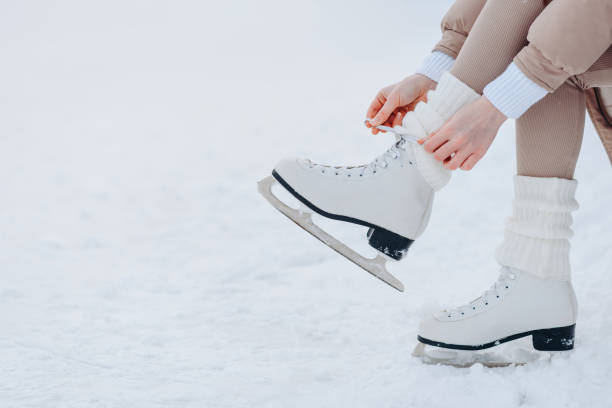 istock young redhead girl in ice rink 2196105471