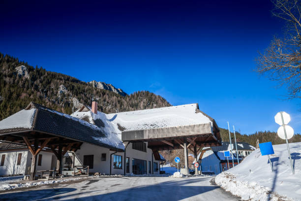 istock Abandoned Jezerski vrh border crossing on Seeberg Saddle, with snow-covered alpine surroundings and open borders between Slovenia and Austria since Slovenia is part of Schengen & European Union. 2196109052