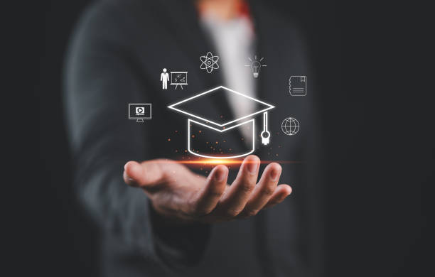 istock Graduate education certificate concept. man hands showing graduation hat, Internet online education course degree, study knowledge to creative thinking idea and problem solving solution 2196114053