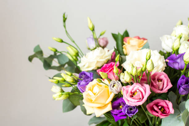 istock Celebrate special occasions with a colorful summer bouquet featuring fresh roses, eucalyptus, and eustoma blooms, creating an elegant and fragrant floral arrangement 2196114353