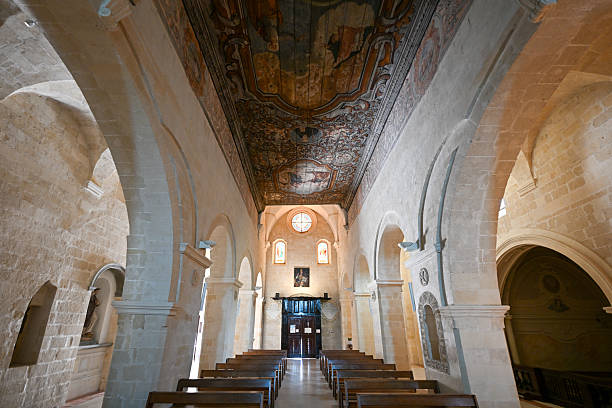 Matera, Basilicata, Italy - Aug 10, 2023: The medieval rock church San Pietro Barisano carved into the tuff, in the old town of the ancient Italian city