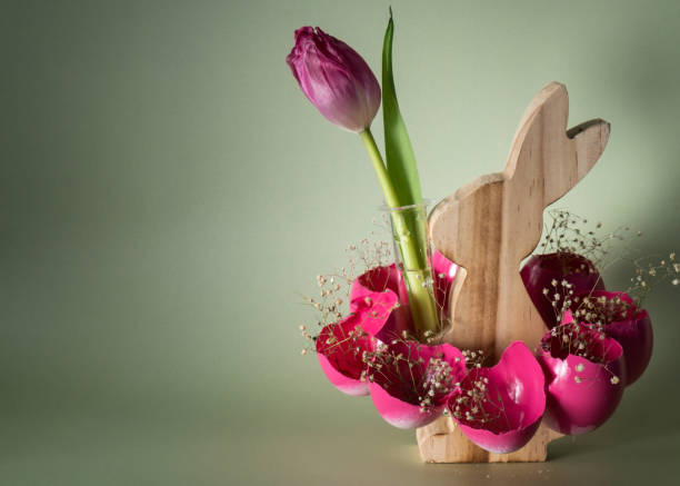 istock Easter holiday decoration from sustainable materials pink colored egg shell wooden bunny vase decor with fresh tulip flower. Copy space Diy do it yourself Gift present idea. Zero waste Crafting preparation 2196120369