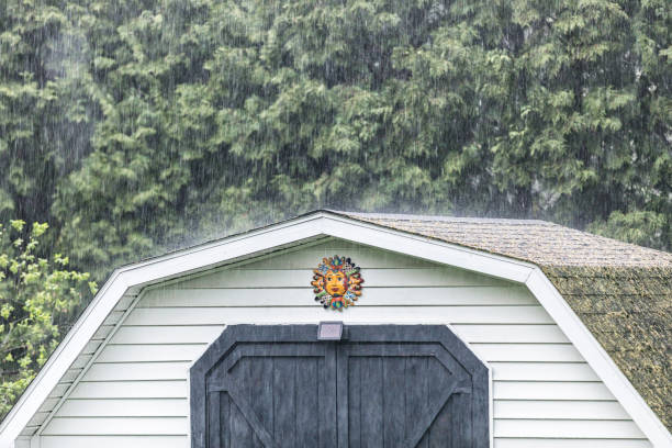 istock Torrential Rain Downpour Drenching Sun Face Garden Shed 2196121876