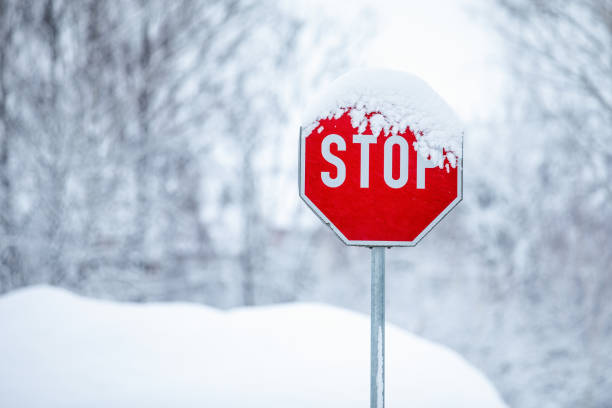 Stop sign against clear blue sky, Red color traffic road warning sign