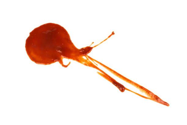 Red tomato sauce ketchup stains and smears