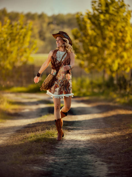 istock Happy female rancher having fun during her walk in nature. 2196136510