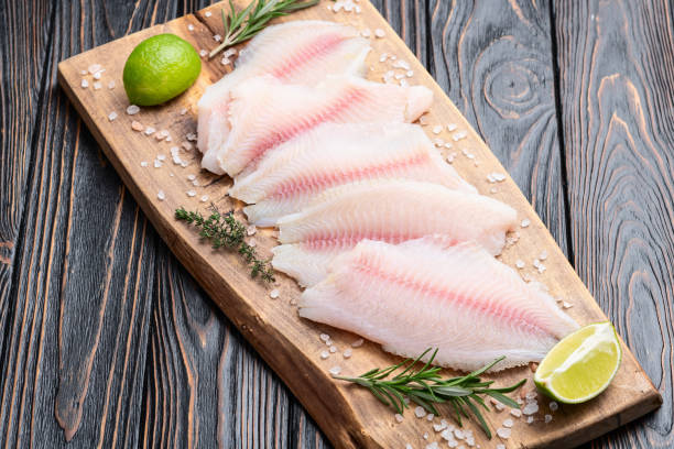 istock Raw tilapia fillet photography . Top view 2196137924