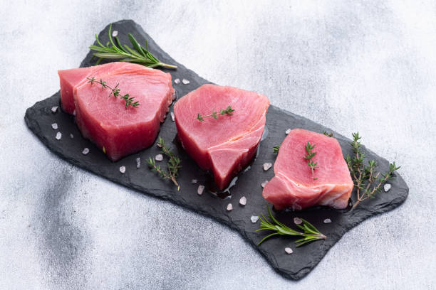 istock Raw tuna steak ( fillet ) photography . Top view 2196137970