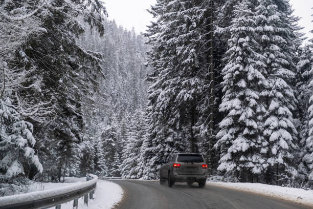 istock Car on Snowy Mountain Road 2196138268