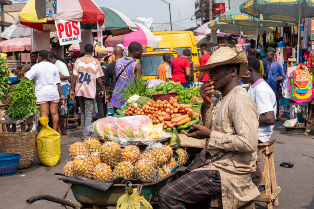 Everydaylife as a man selling fruits waits for customers in Lagos Nigeria on January 25, 2025. Inflation: 13 million Nigerians at risk of falling below poverty line in 2025