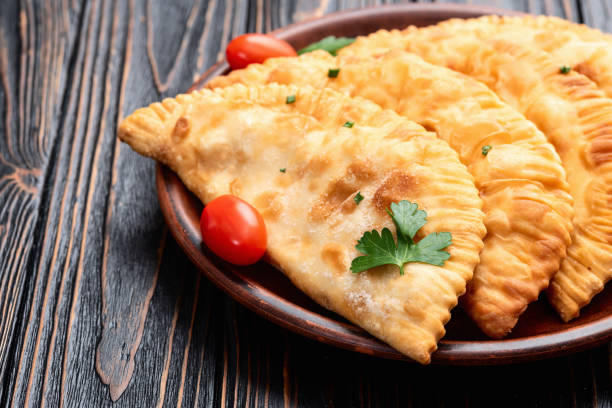 istock Snack chebureks. Pasties with meat photography . Top view 2196141050