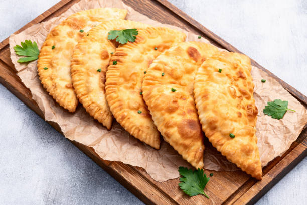 istock Snack chebureks. Pasties with meat photography . Top view 2196141052
