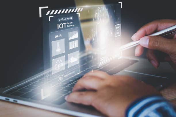 istock Businessman Young Smart farmer using smart computer, directive track control agriculture Farm, icon futuristic AI data, Control agricultural production technology industry system and trading orders. 2196143718