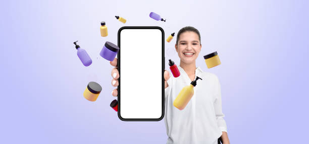 istock Smiling person holding smartphone with blank screen surrounded b 2196144550