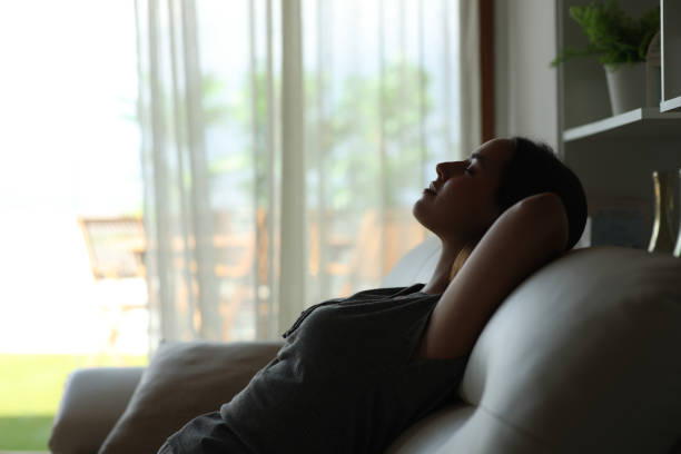 istock Woman napping in a house interior 2196144617