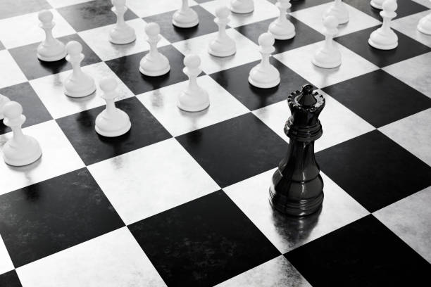 White pawns against queen on the chessboard