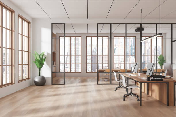 istock Modern open-space office interior with large windows and wooden floors. 3D Rendering 2196146243