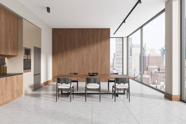 istock Modern dining room with wood accents and cityscape view through large windows. 3D Rendering 2196146469