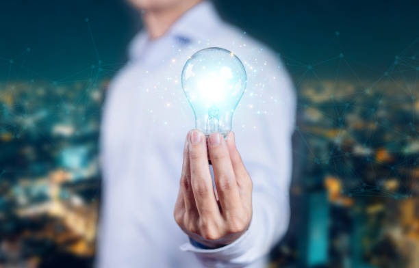istock Light bulbs bright creative idea is a complete idea connected to business with art background. Lamp light has hands and digital concept. 2196146950