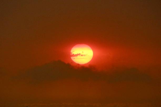 istock Red sun at dusk over Melbourne 2196153878