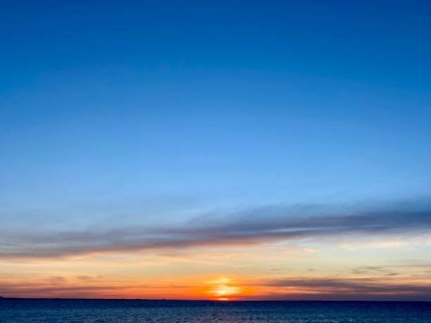 istock Stunning sunset / sunrise with serene sky 2196154122
